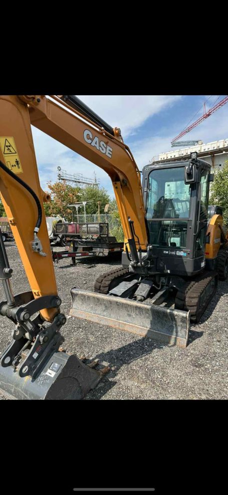 Heavy-duty Case construction equipment displayed in a worksite setting, showcasing various machinery and tools.